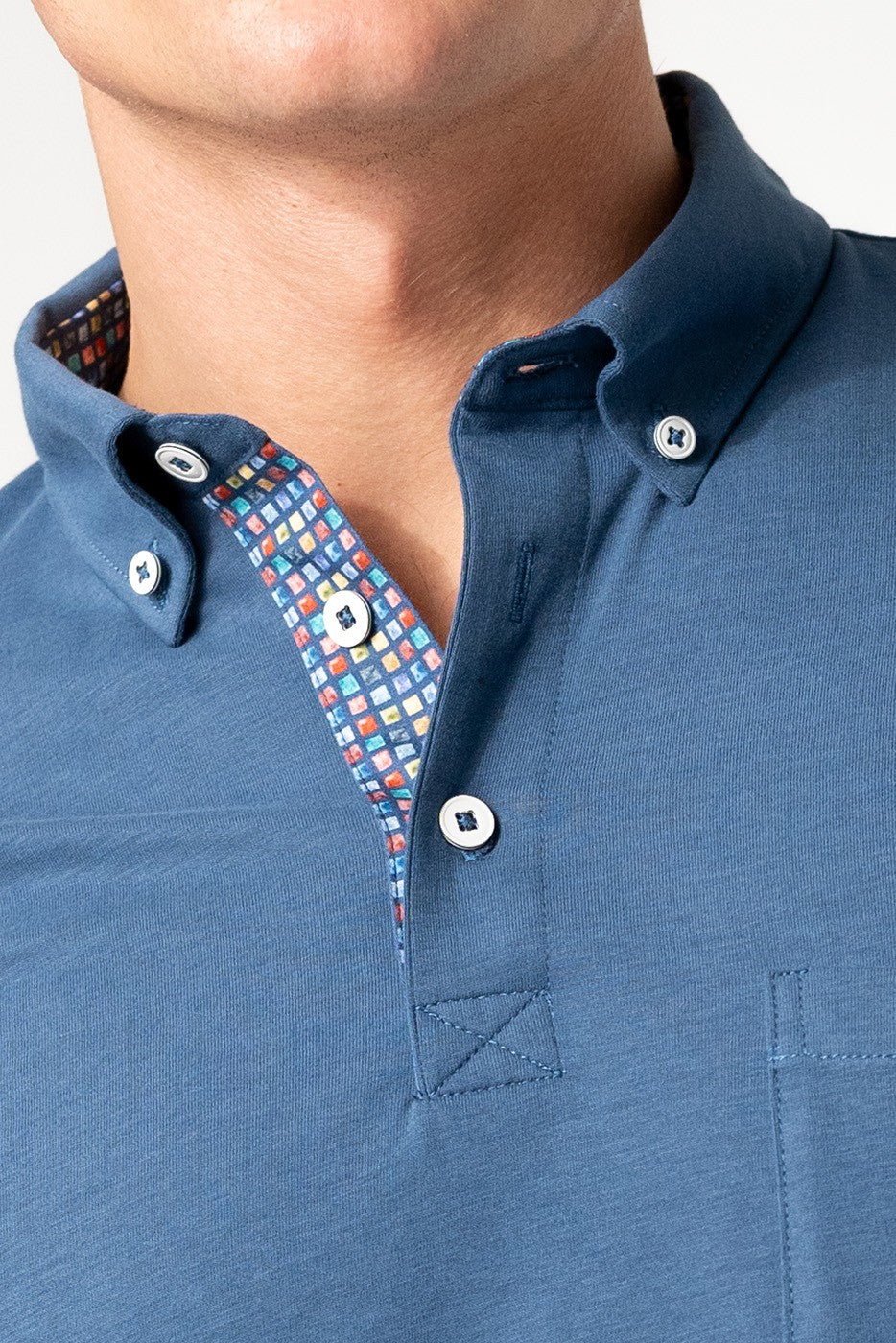 Polo hombre de punto manga larga con bolsillo azul