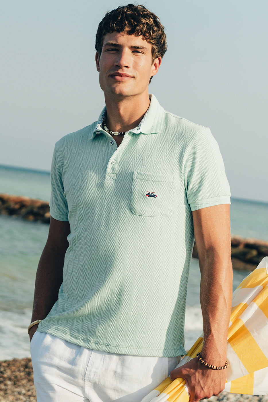 Polo hombre turquesa con bolsillo