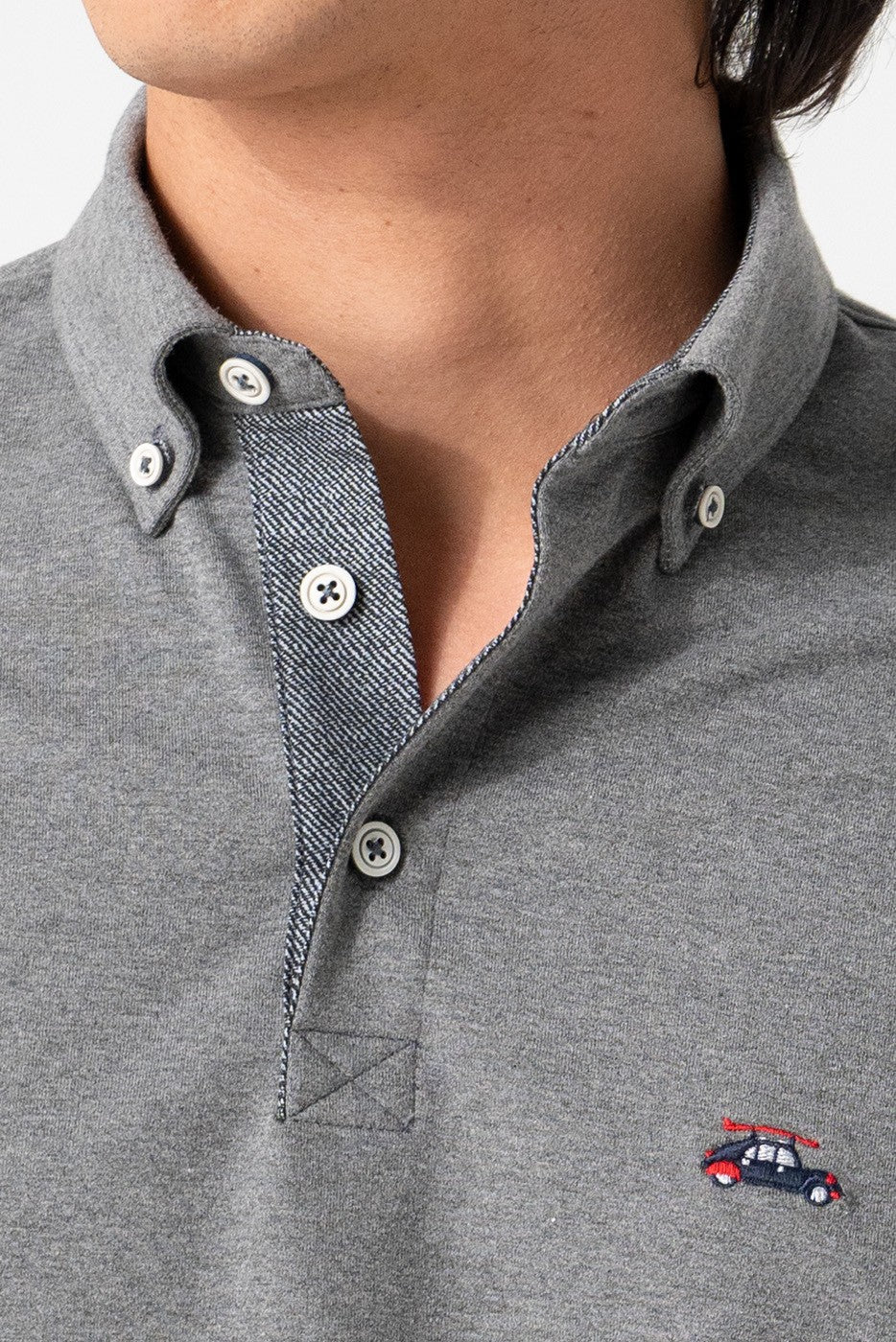 Polo hombre gris manga larga cuello camisero de punto