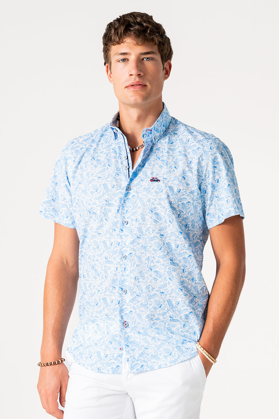 Camisa hombre manga corta estampado hojas azules