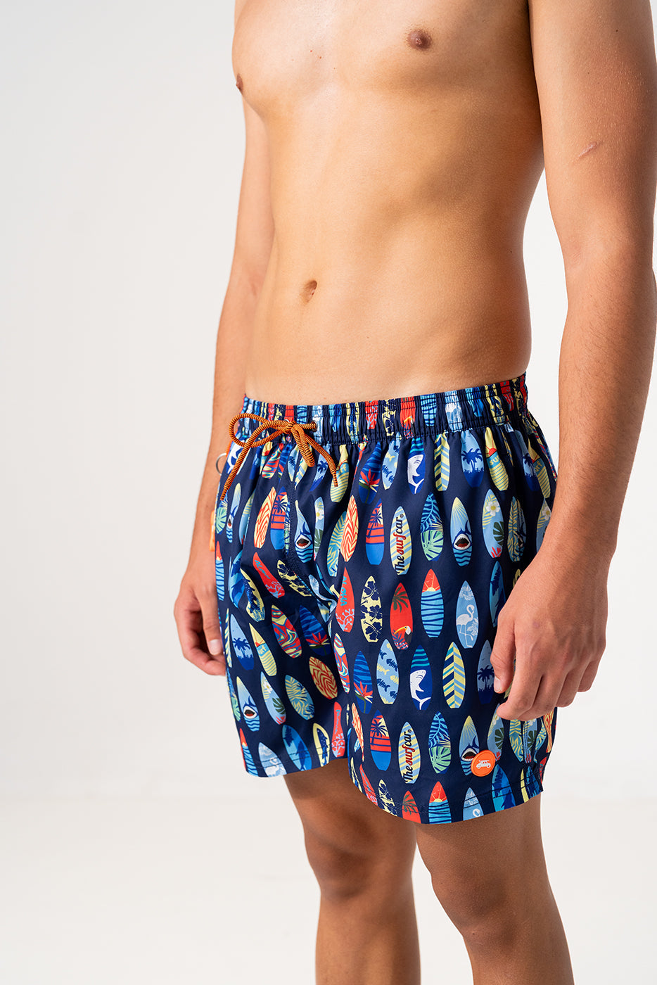 Bañador hombre marino con tablas surf colores