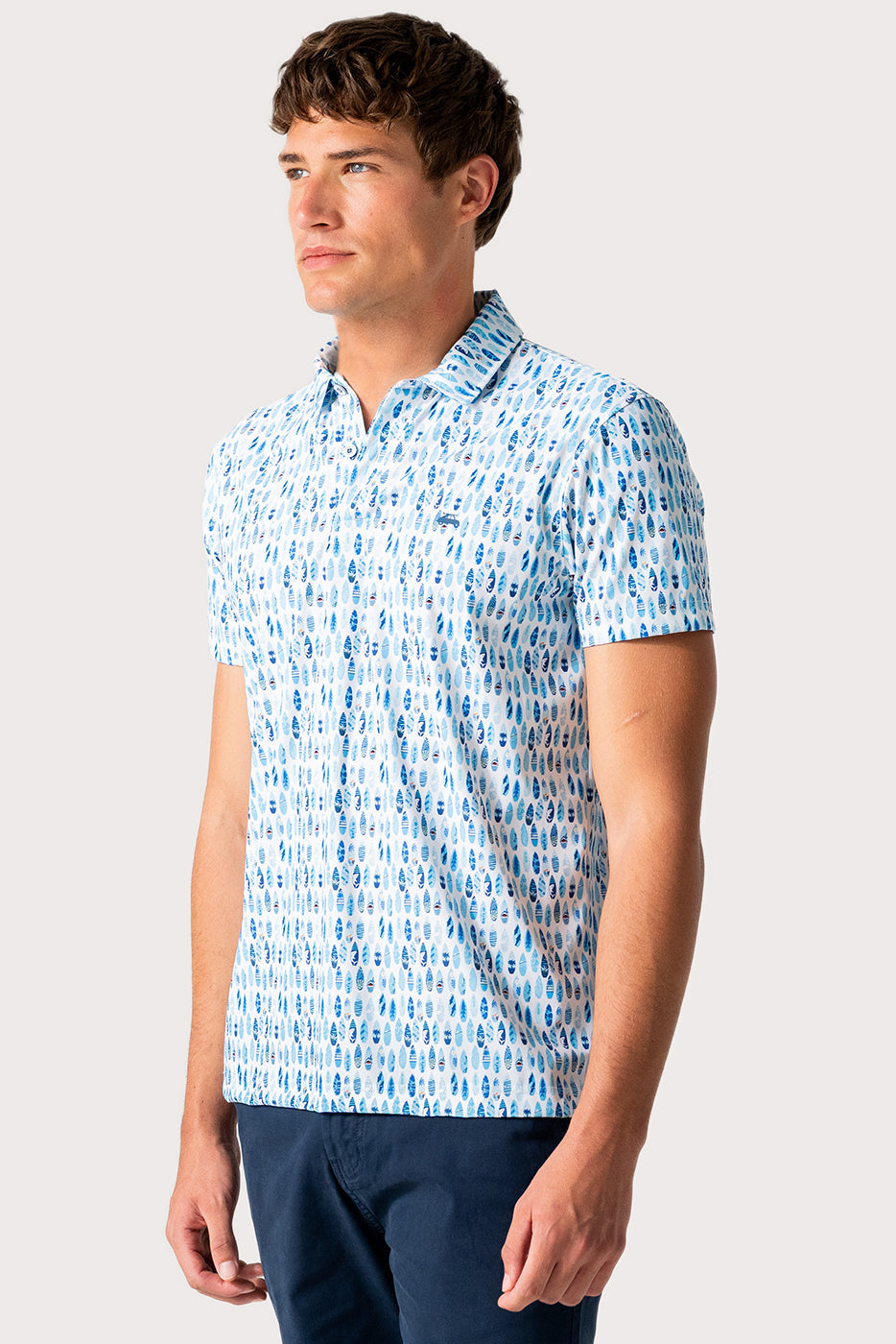 Polo hombre en tejido técnico estampado tablas de surf